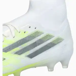 Ghete de fotbal adidas F50 Pro Mid FG/AG pentru femei (PSH-JR8954-P) adidas Born For Goals, Adidas F50, adidas Icon Takeover, Ghete Elite / Profesionale, Ghete fotbal sintetic, Ghete pentru iarbă